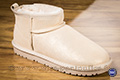 Boots fourrées dorées en cuir